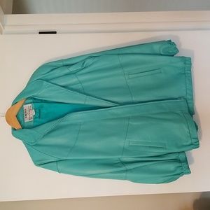 Dero leather jacket. Like new. Small.